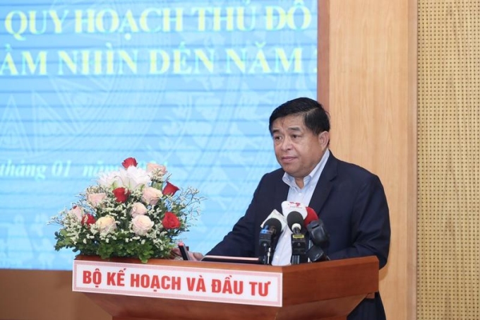 Le ministre Nguyen Chi Dung a pris la parole lors de la conférence le matin du 9 janvier. Photo : VGP