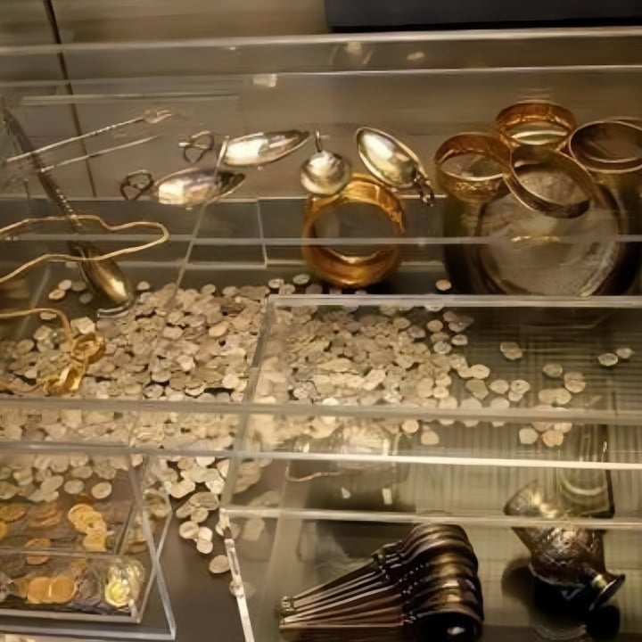 The treasure includes many ancient silver and gold coins and valuable jewelry.