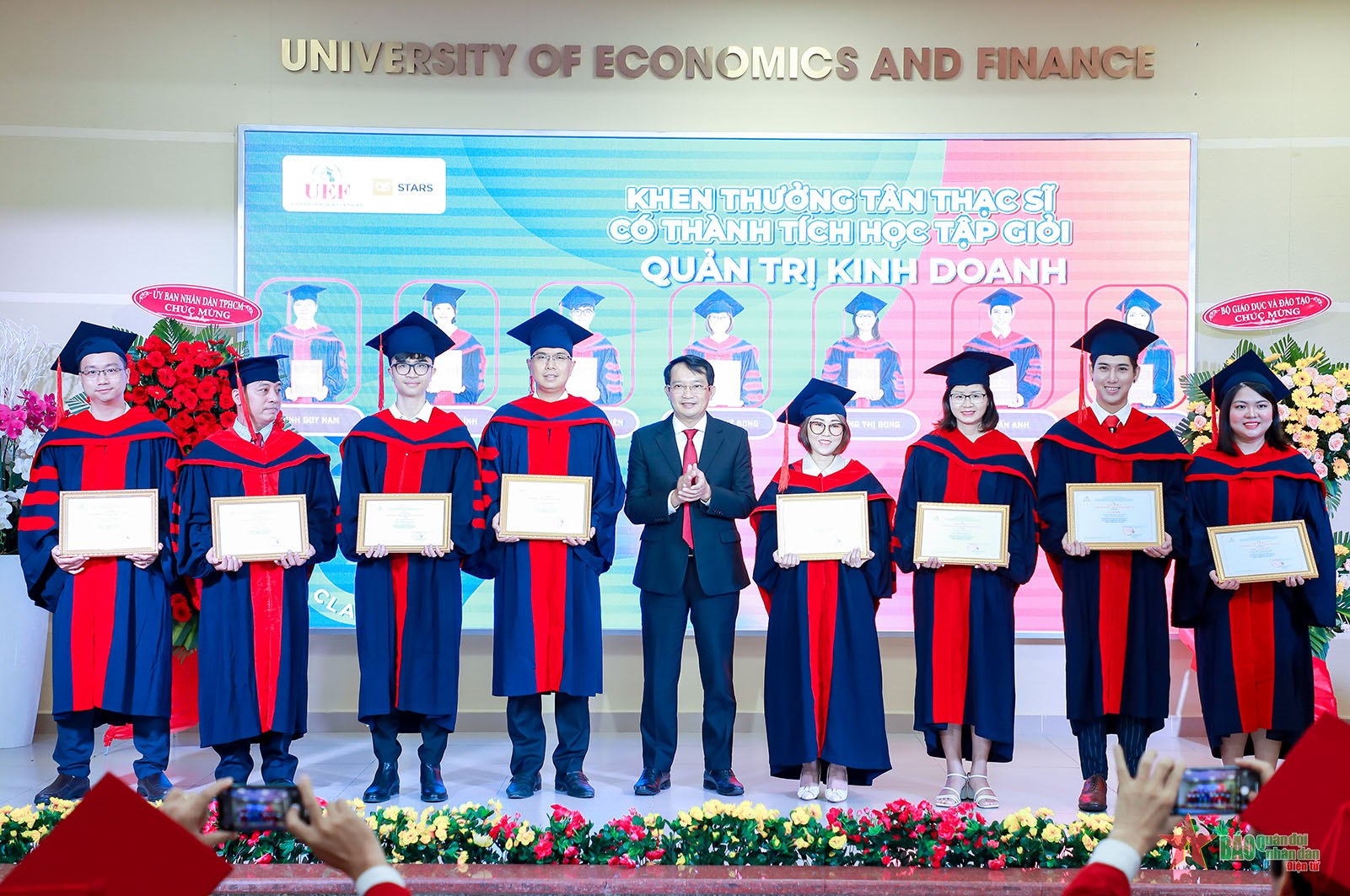 Awarding degrees to more than 100 PhD and Master graduates