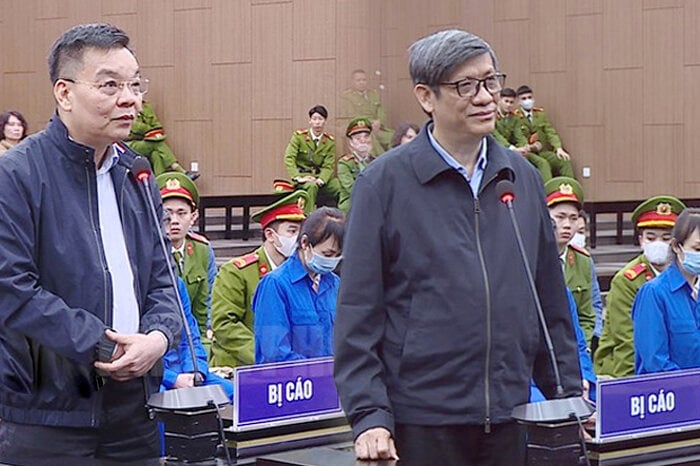 M. Chu Ngoc Anh et Nguyen Thanh Long au tribunal.