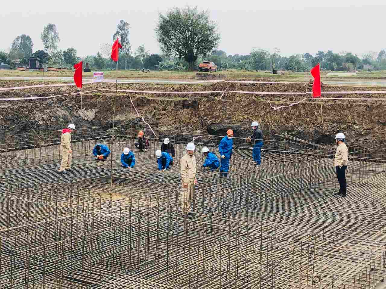 Ouvriers du bâtiment sur le chantier. Photo : Cuong Ngo