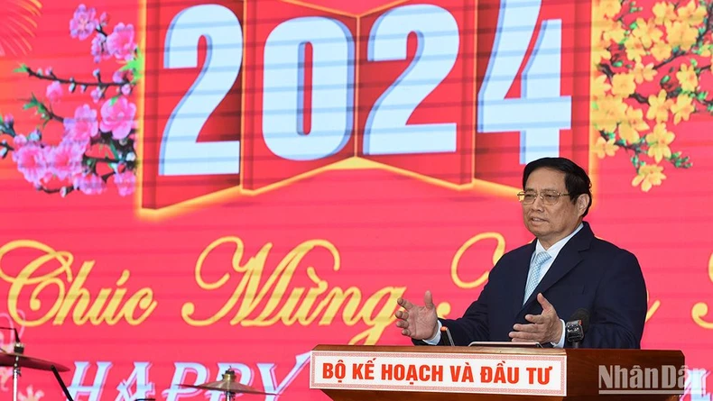 Le Premier ministre Pham Minh Chinh a organisé une réception pour les sponsors et les entreprises étrangères à l'occasion du traditionnel Nouvel An. Photo 3