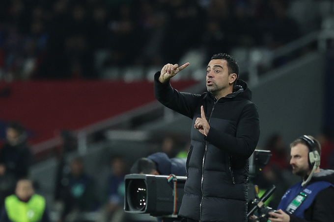 Coach Xavi directs Barca's 2-1 win over Porto in Group H of the Champions League on November 28. Photo: AFP