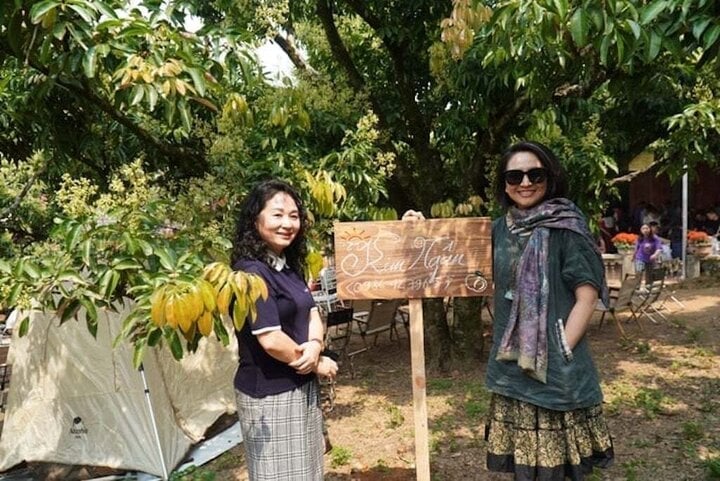 Tourists buy seasonal lychee trees to take care of and harvest the fruit themselves.