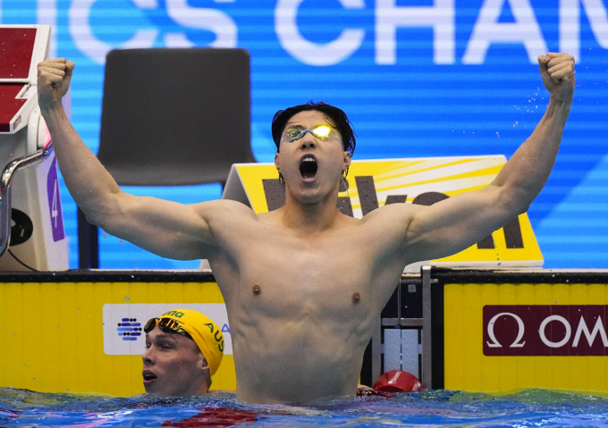 Chinese swimming frog prince Qin Haiyang won four gold medals at the 19th Asian Games. Photo: Kyodo