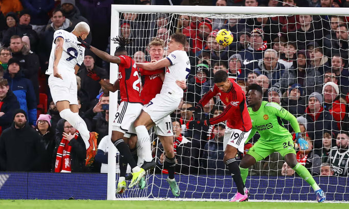 Striker Richarlison (left) headed the equalizer for Tottenham. Photo: Reuters