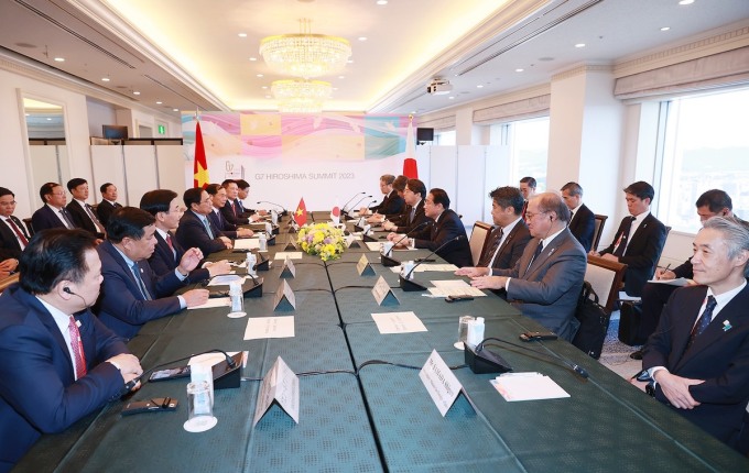 Prime Minister Pham Minh Chinh held talks with Prime Minister Kishida Fumio on May 21 in Hiroshima, Japan. Photo: Nhat Bac