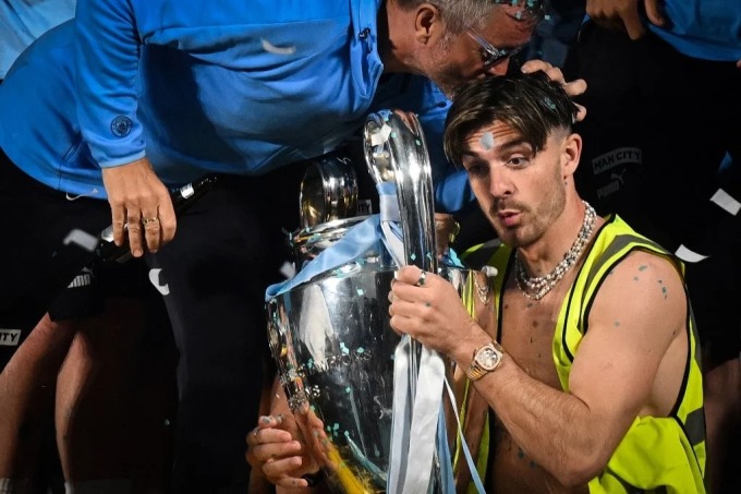 Grealish at the treble celebration party with his Man City teammates after the parade on the streets of Manchester on June 12. Photo: PA