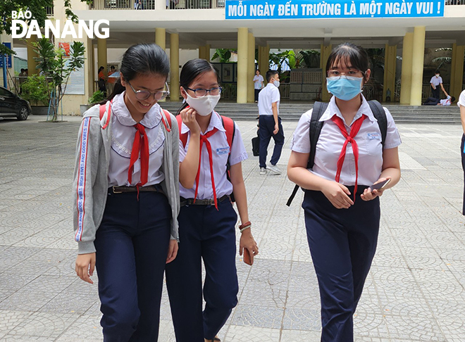 Candidates taking specialized subjects exams at Tran Phu High School leave.