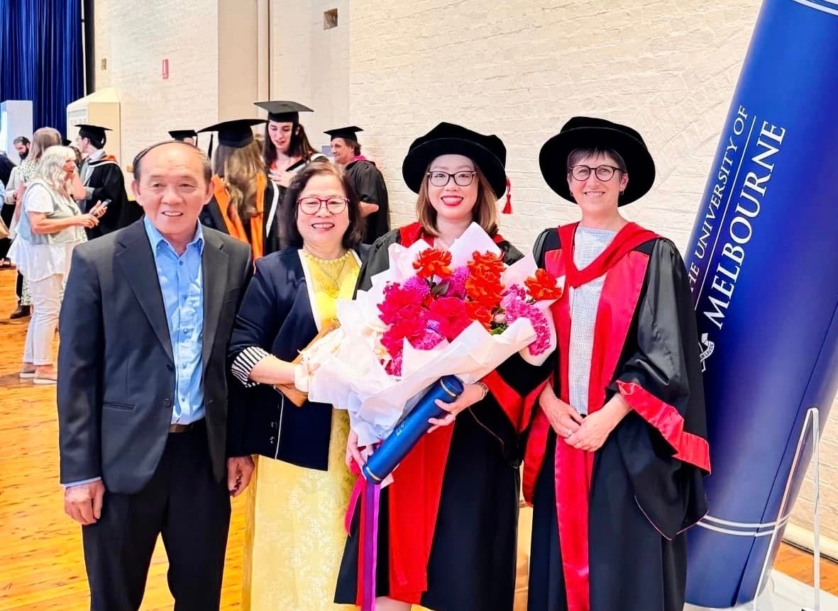 Minh Phuong (3rd from left) with her parents and lecturers at her PhD graduation ceremony at the University of Melbourne, Australia, December 2024.