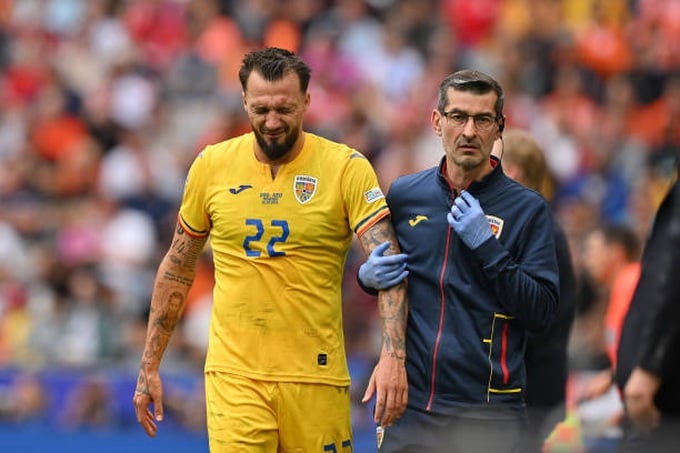 munich-germany-vasile-mogos-of-romania-reacts-as-he-receives-medical-treatment-during-the.jpg