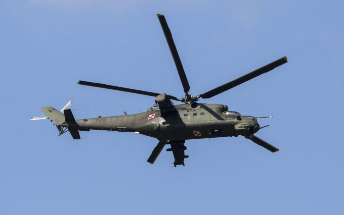 Polish Mi-24 helicopters fly during a drill in Oleszno, northwestern Poland, June 2014. Photo: Reuters