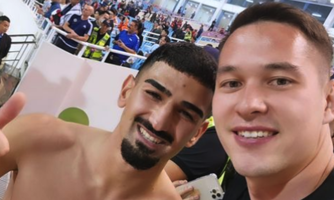 Filip Nguyễn (phải) gặp Merchas Doski sau trận Việt Nam thua Iraq 0-1 ở sân Mỹ Đình hôm 21/11. Ảnh: Instagram/filipng1