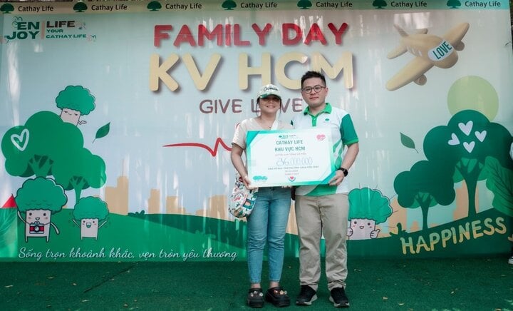 La succursale de Cathay Life à Ho Chi Minh-Ville organise une « Journée de la famille » avec le message « Give Love - 3 »