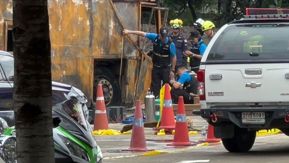 Police investigate at the scene of the accident. Photo: BANGKOK POST