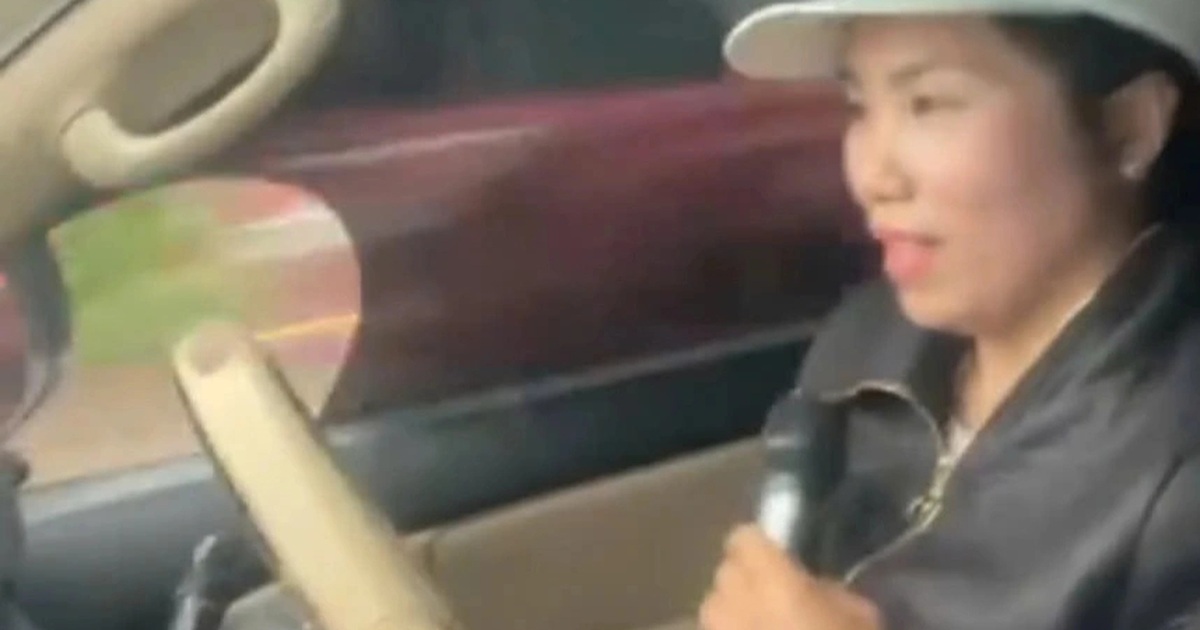 Woman driving and singing karaoke: Identity has been determined