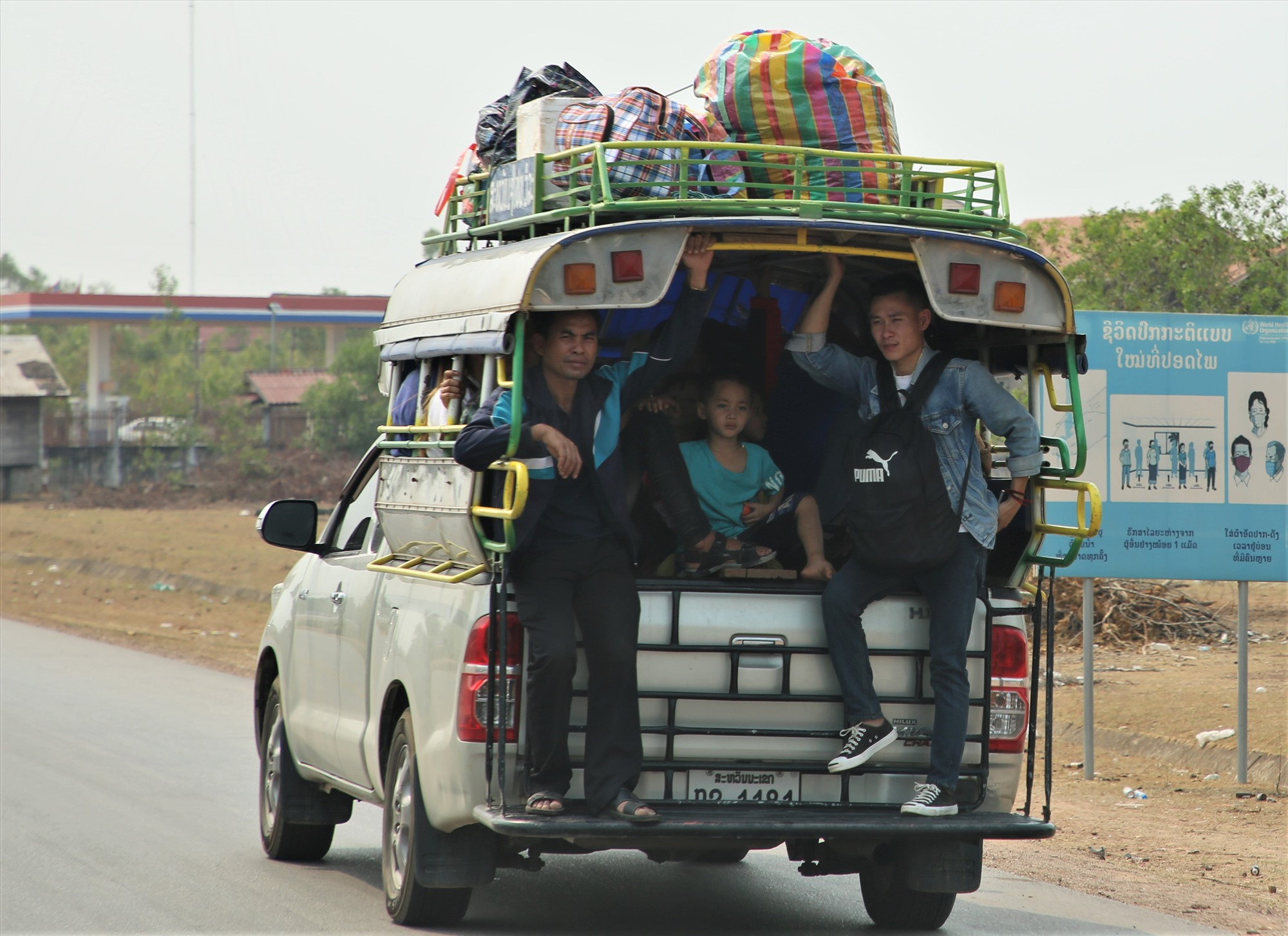 Lao people return home by public transport on the eve of the traditional Bunpimay New Year. Photo: ALANG NGUOC