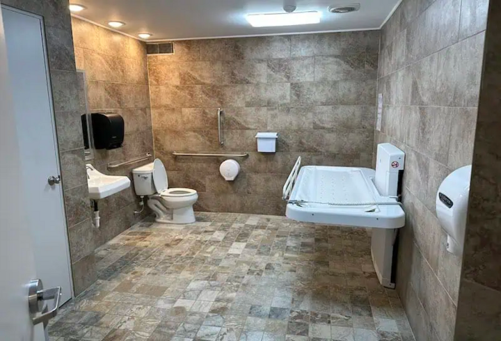 The restrooms at the Natchez Trace State Park Visitor Center in Wildersville, Tennessee, are thoughtfully designed to accommodate everyone. The restrooms feature adult changing tables with sturdy, sanitary surfaces that are accessible to caregivers and those who need assistance. (Photo: Cintas)