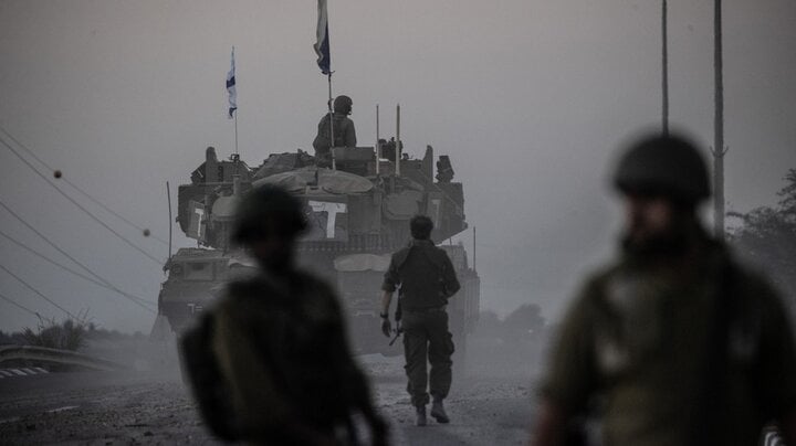 Israeli tanks move in foggy weather near the Gaza border on October 12. (Photo: Getty Images)