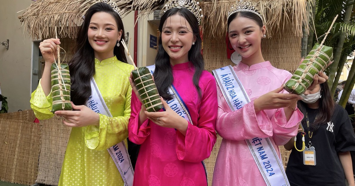 Miss Kieu Duy und 2 Zweitplatzierte bei der Wahl zur Miss Vietnam National Experience ... beim Verpacken von Banh Tet