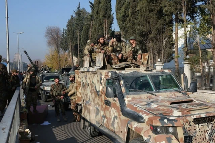 Hombres armados de un grupo de oposición en Damasco, Siria, el 9 de diciembre. (Foto: Reuters)