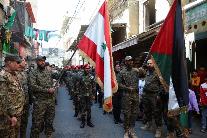 Members of the Popular Front for the Liberation of Palestine-General Command march during a parade marking the annual al-Quds Day, (Jerusalem Day), at Burj al-Barajneh Palestinian refugee camp in Beirut, Lebanon on April 14, 2023 [Mohamed Azakir/Reuters]