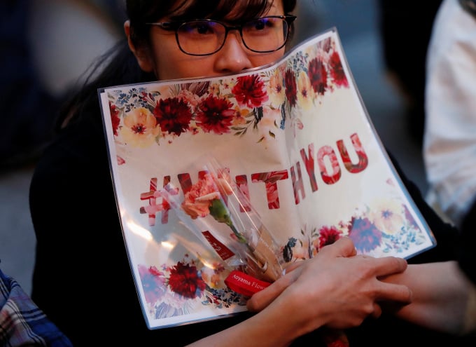 Demonstranten während der Flower Demo-Bewegung in Tokio, Japan, im Juni 2019. Foto: Reuters