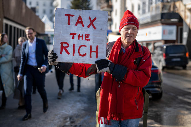 British millionaire Phil White calls for a tax on the rich at the World Economic Forum in Davos, Switzerland, January 18. Photo: AFP