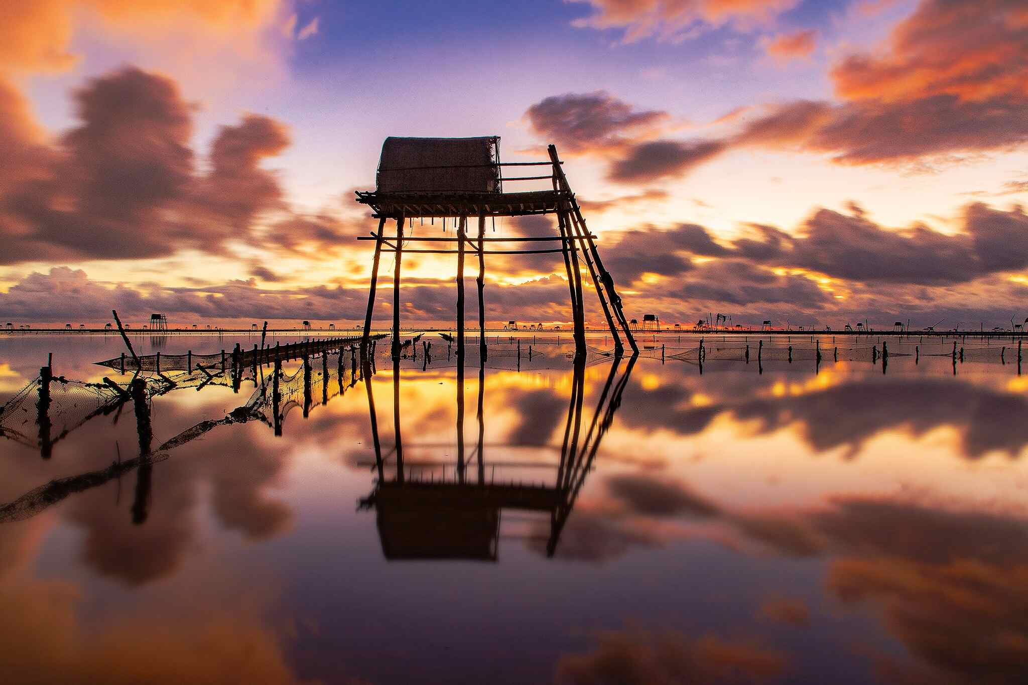 Besucher, die den Sonnenaufgang jagen, können nicht nur die wunderschöne Landschaft bewundern, sondern auch die ganz besondere frische Luft des windigen Strandes genießen.