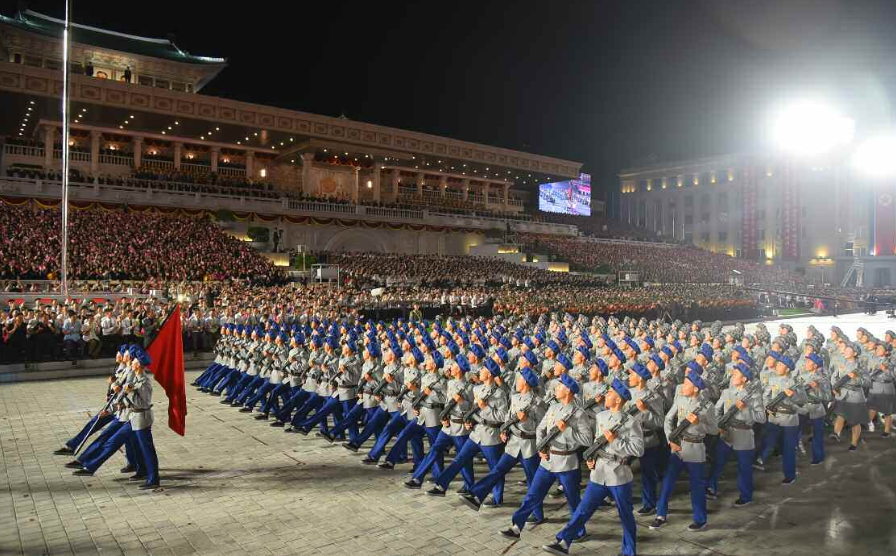 World - Mr. Kim Jong Un and his daughter attend the parade celebrating North Korea's national day (Photo 4).