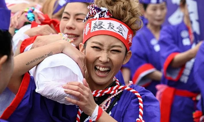 Women participate in Japan's first naked festival