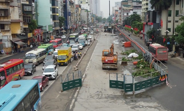 Why is it proposed to remove the regulation on passenger cars turning around on Kim Dong Street? Photo 1