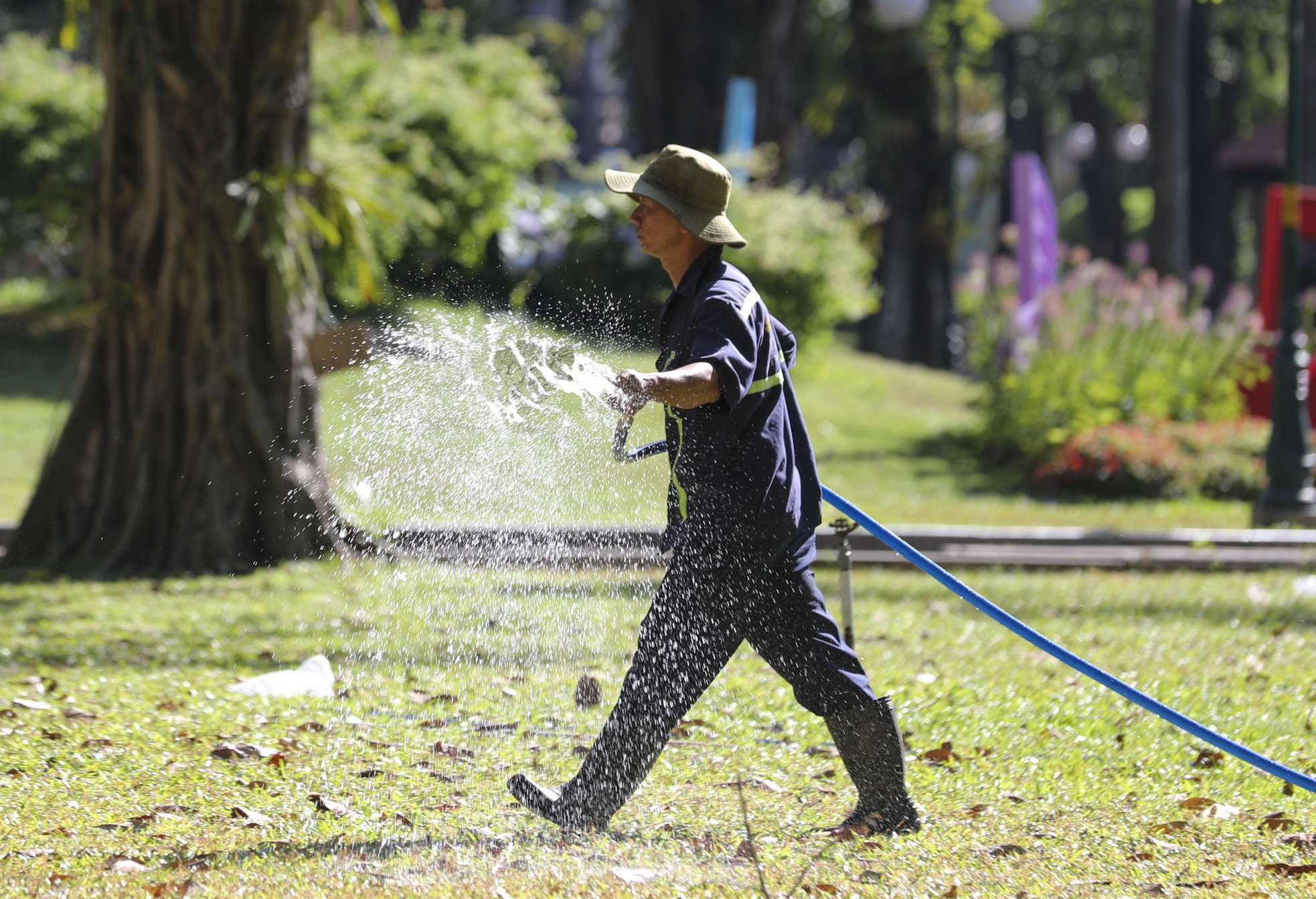 Los residentes de la ciudad de Ho Chi Minh sufren un calor de 40 grados (foto 8)