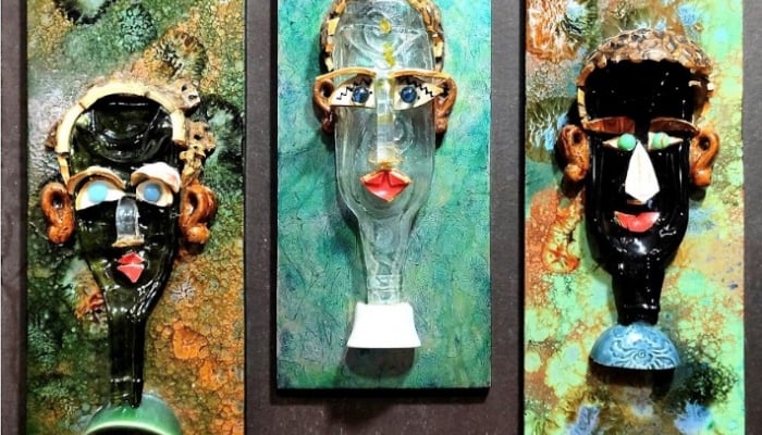 Ceramic mosaic portrait on lacquer background by artist To Ngoc Trang