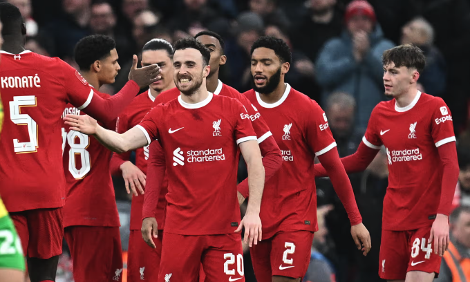 Striker Diogo Jota celebrates with teammates after scoring for Liverpool. Photo: AFP