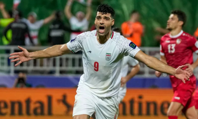 Striker Mehdi Taremi celebrates scoring against Syria in the round of 16 at Abdullah bin Khalifa Stadium, helping Iran become the last team to advance in the first round, but he will be suspended for the quarter-finals of the 2023 Asian Cup. Photo: AP