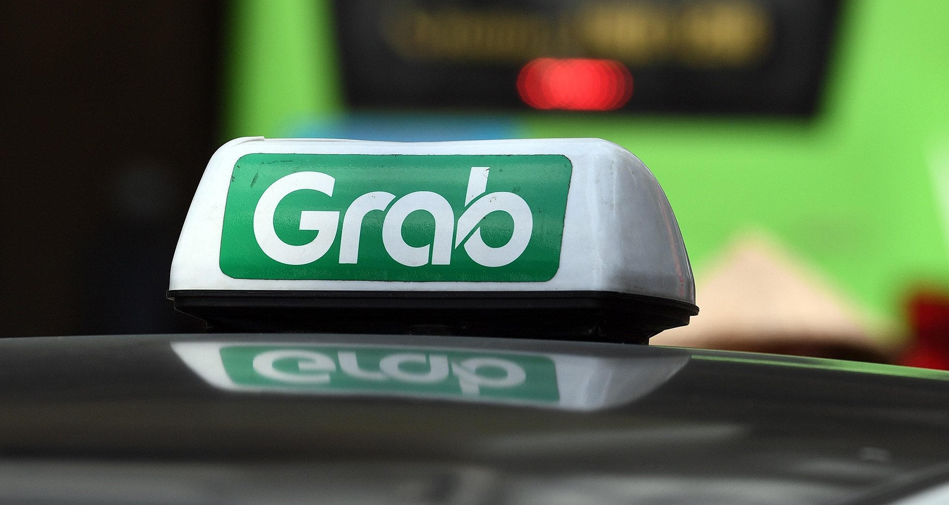 Grab lần đầu tiên báo lãi