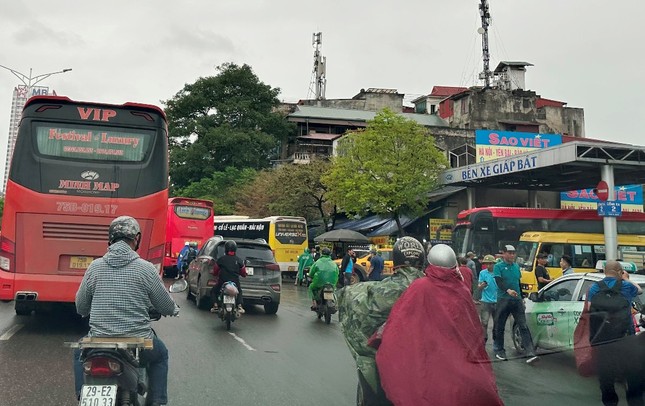 Why is it proposed to remove the regulation on passenger cars turning around on Kim Dong Street? photo 6