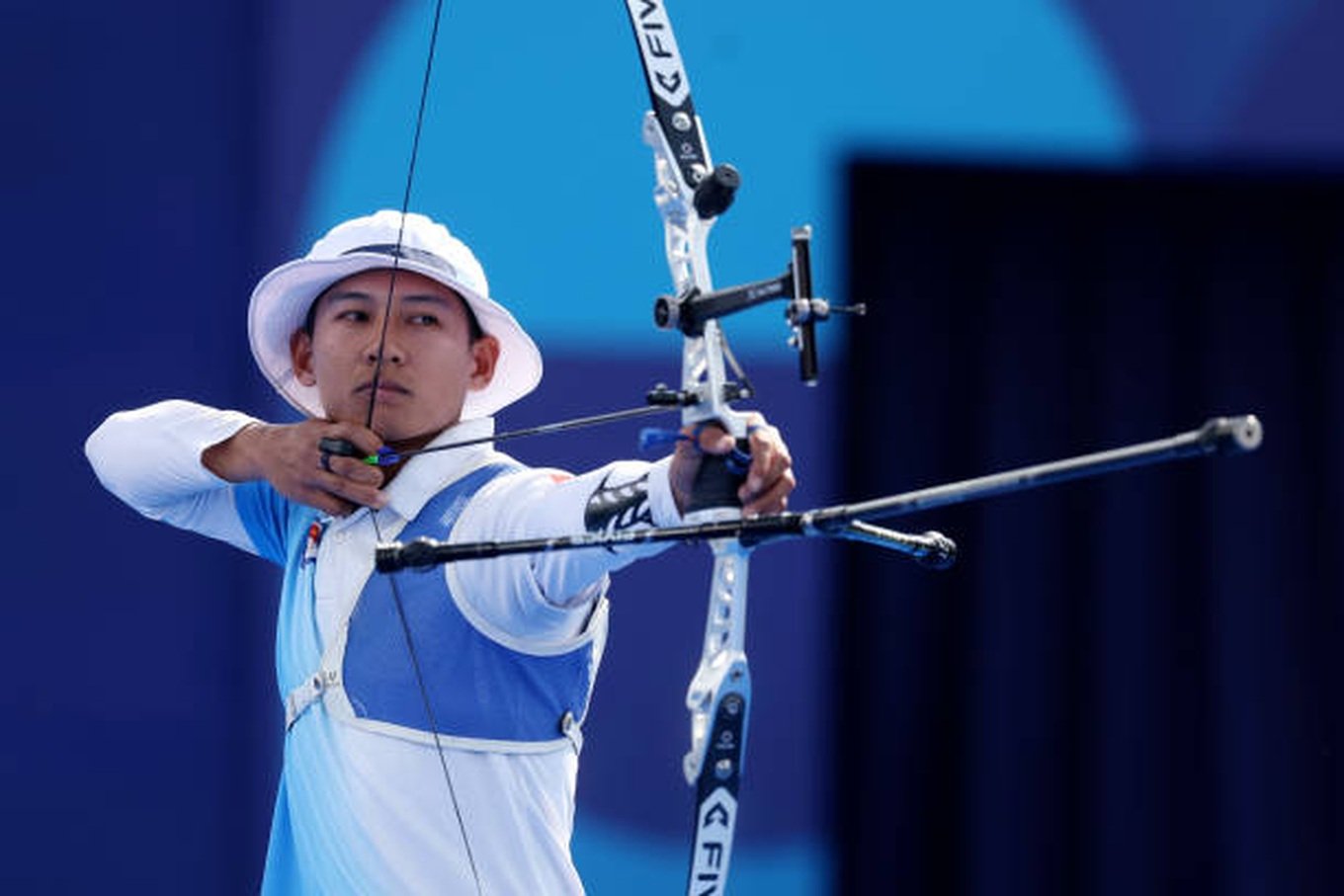 paris-france-phong-le-quoc-of-team-vietnam-competes-during-the-archery-mens-individual-1-32.jpg