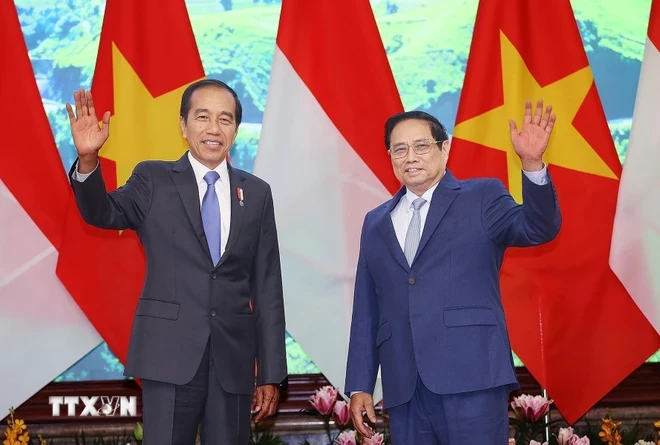 En la tarde del 12 de enero de 2024, en Hanói, el primer ministro Pham Minh Chinh se reunió con el presidente de la República de Indonesia, Joko Widodo. (Foto: Duong Giang/VNA)
