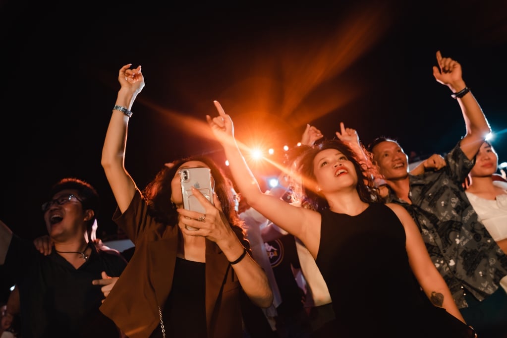 Visitors immerse themselves in the music.