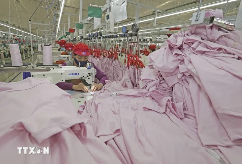 Couture pour l'exportation. (Photo : Tran Viet/VNA)