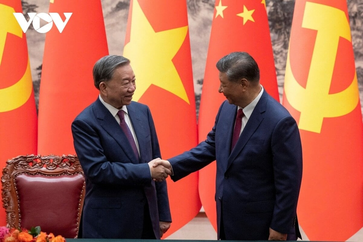 Le secrétaire général et président Xi Jinping et le secrétaire général et président To Lam.