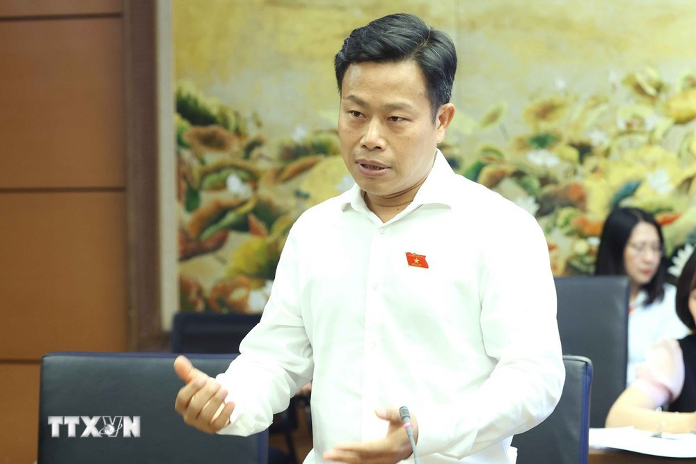 ttxvn_cai_cach_tien_luong_2506-2.jpg
