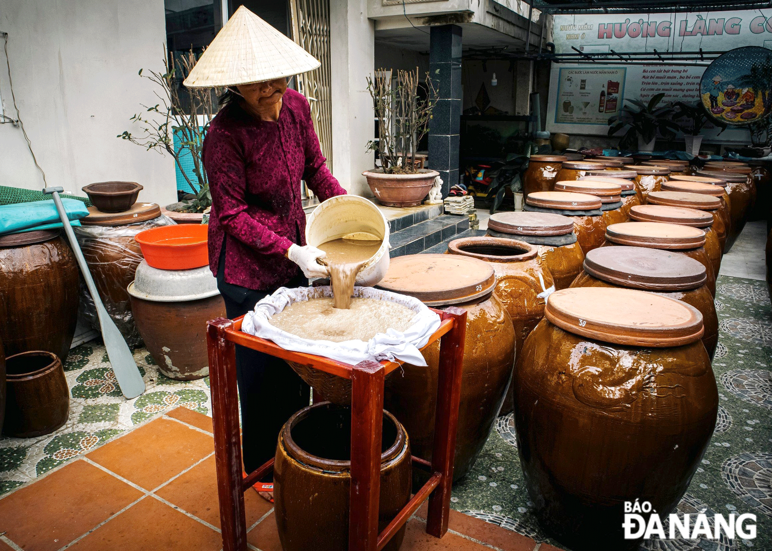 With many unique characteristics in quality as well as geographical conditions, Nam O fish sauce has been affirming itself as a typical rural product. Photo: PHAM TOAN