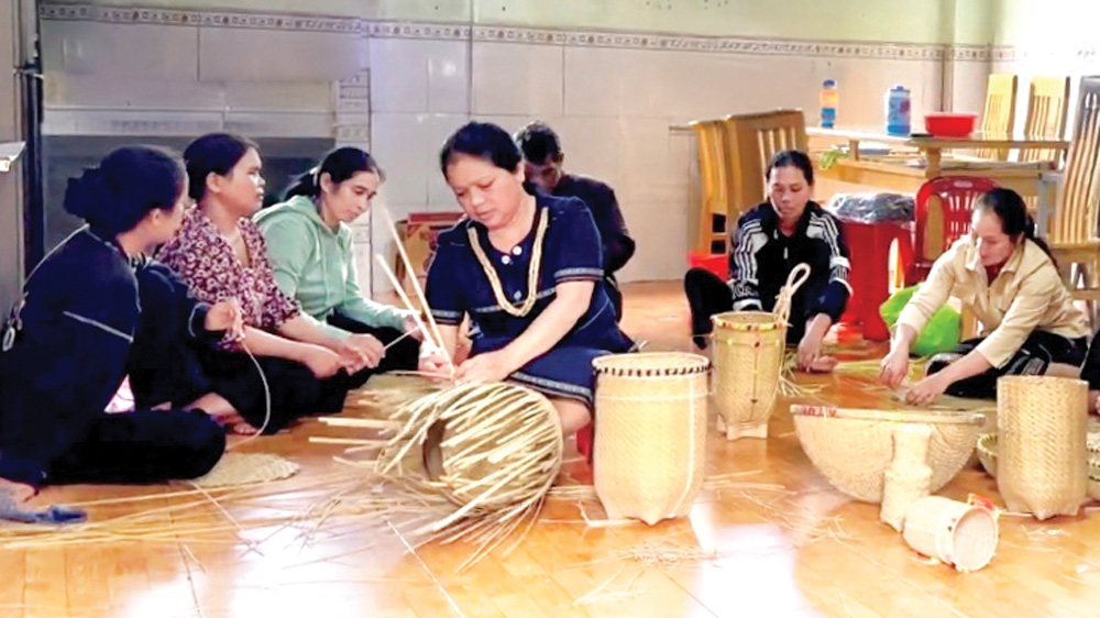 Artisan Ka Ep guides people in Due village to weave baskets and other bamboo and rattan items...
