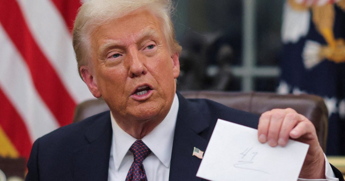 Mr. Trump shows off the letter sent back by Mr. Biden