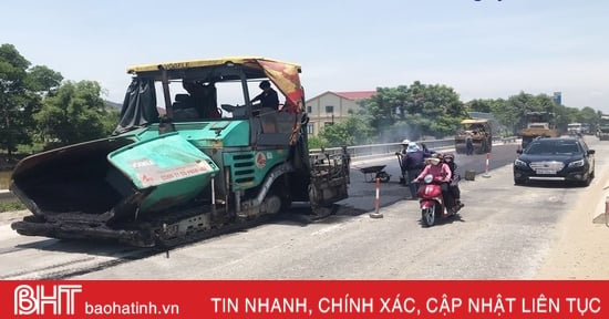 How is National Highway 1 through Ha Tinh being repaired?