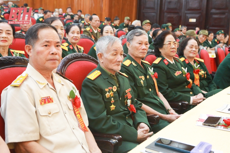 Meeting to celebrate the 75th anniversary of the traditional day of Vietnamese volunteer soldiers and military experts helping the Lao revolution