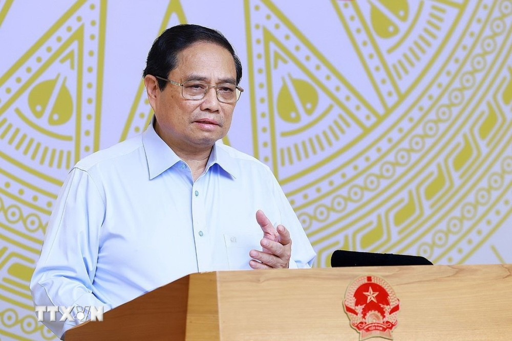 Prime Minister Pham Minh Chinh chairs the 9th meeting of the Central Council for Emulation and Rewards. (Photo: Duong Giang/VNA)